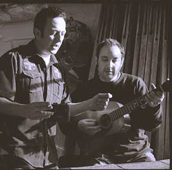 smokey hormel playing guitar with Joe Strummer